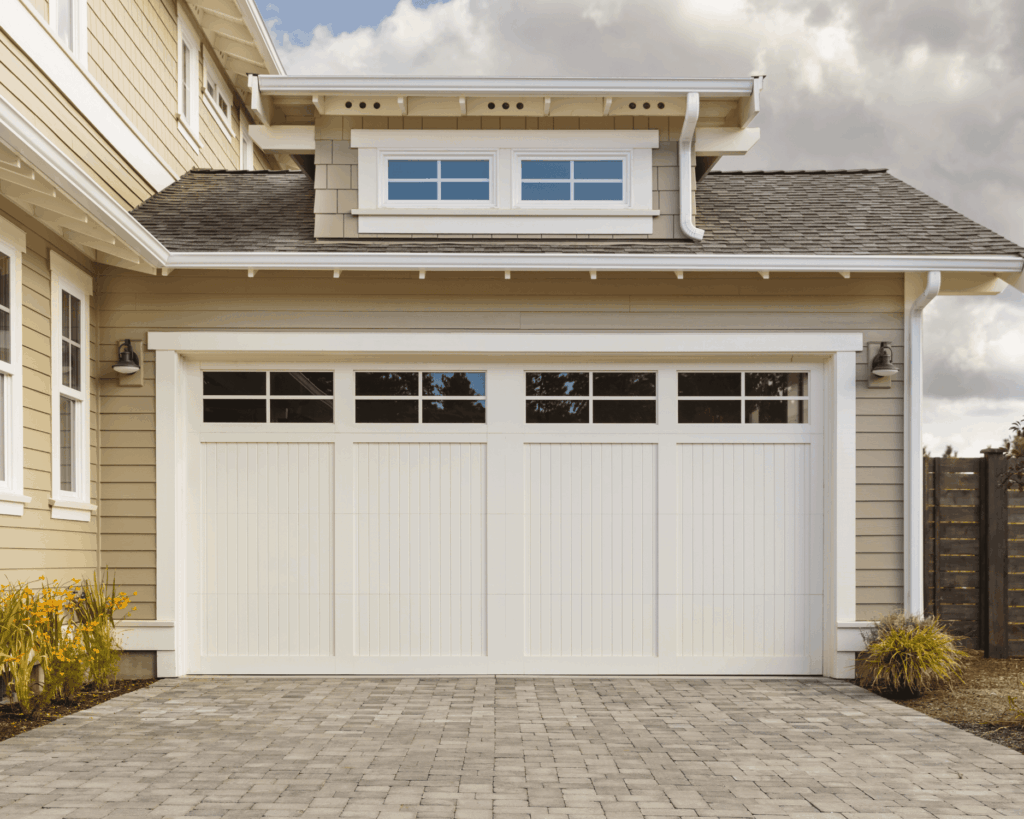 a two door white garage with partial view windows on a suburban home-garage renovations in round rock
