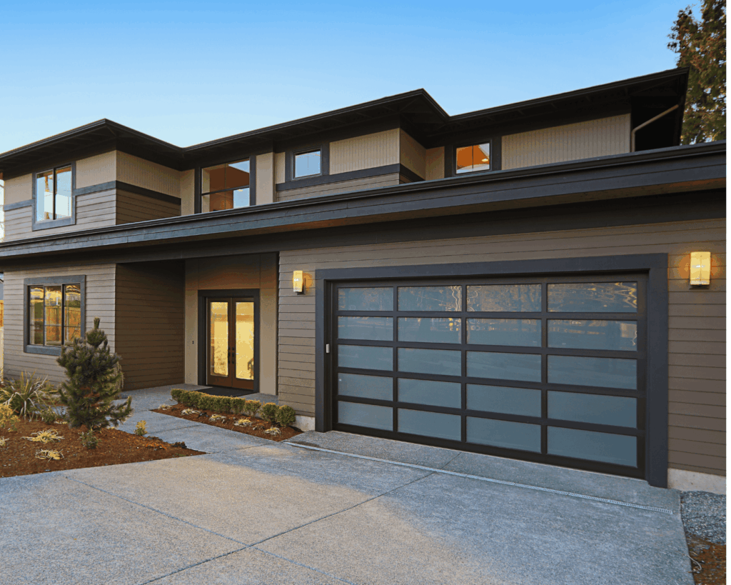 a modern home with a new full view garage door