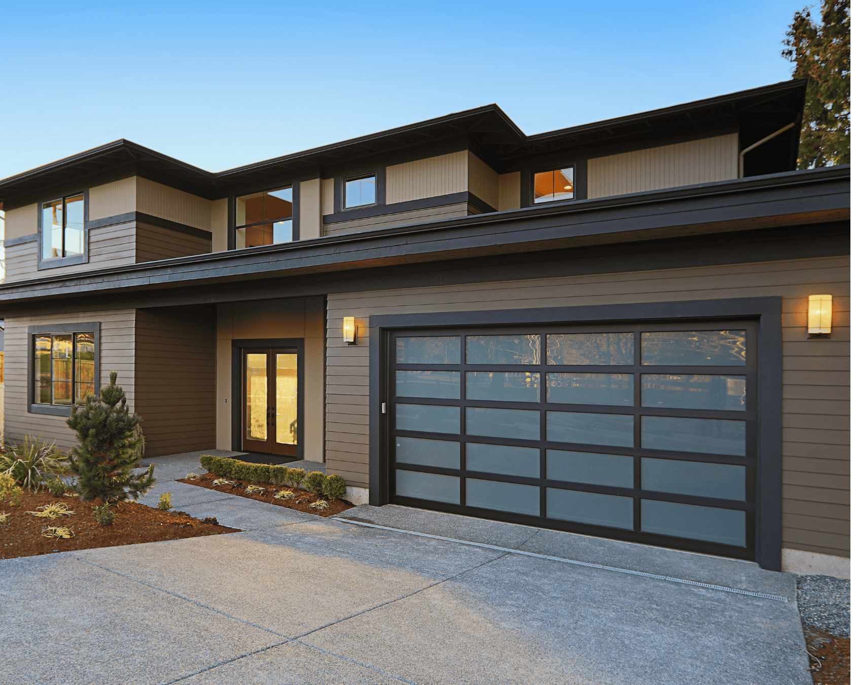 a modern home with a new full view garage door