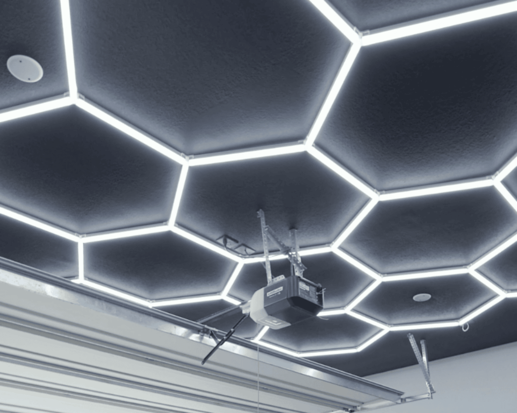 A new garage door system with hexagon lighting that was installed by Garage Up.