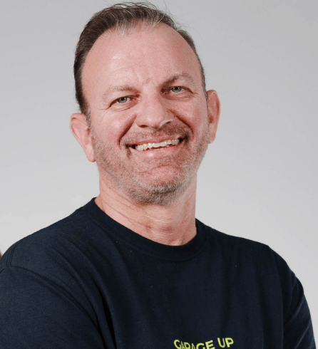 a headshot of Garage Up Central Austin owners Pam & Danny