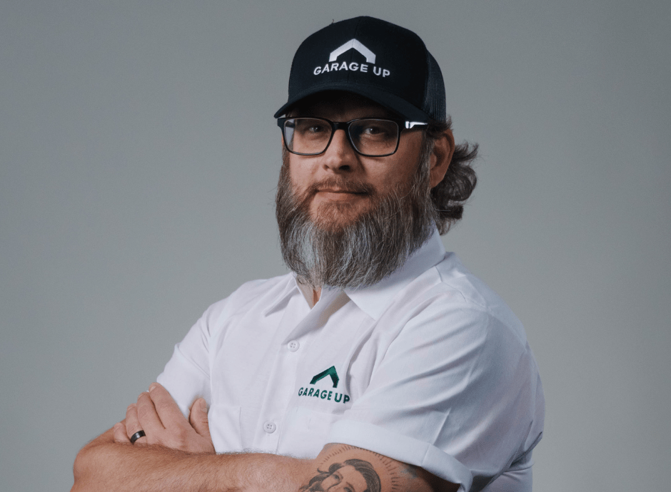 Owner of Garage Up Cypress, Heath Samples, posing for a photo.