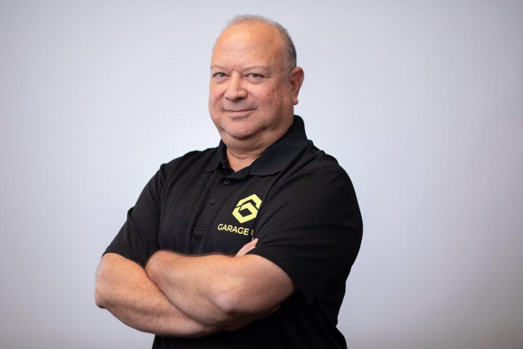 The owner and operator of Garage Up Frisco -Plano, Fernando Davila.