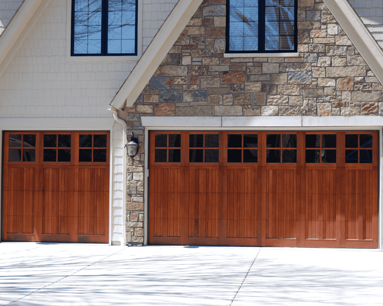 The garage doors of a newly renovated garage in Frisco, Texas by Garage Up - garage renovations in willow bend country club