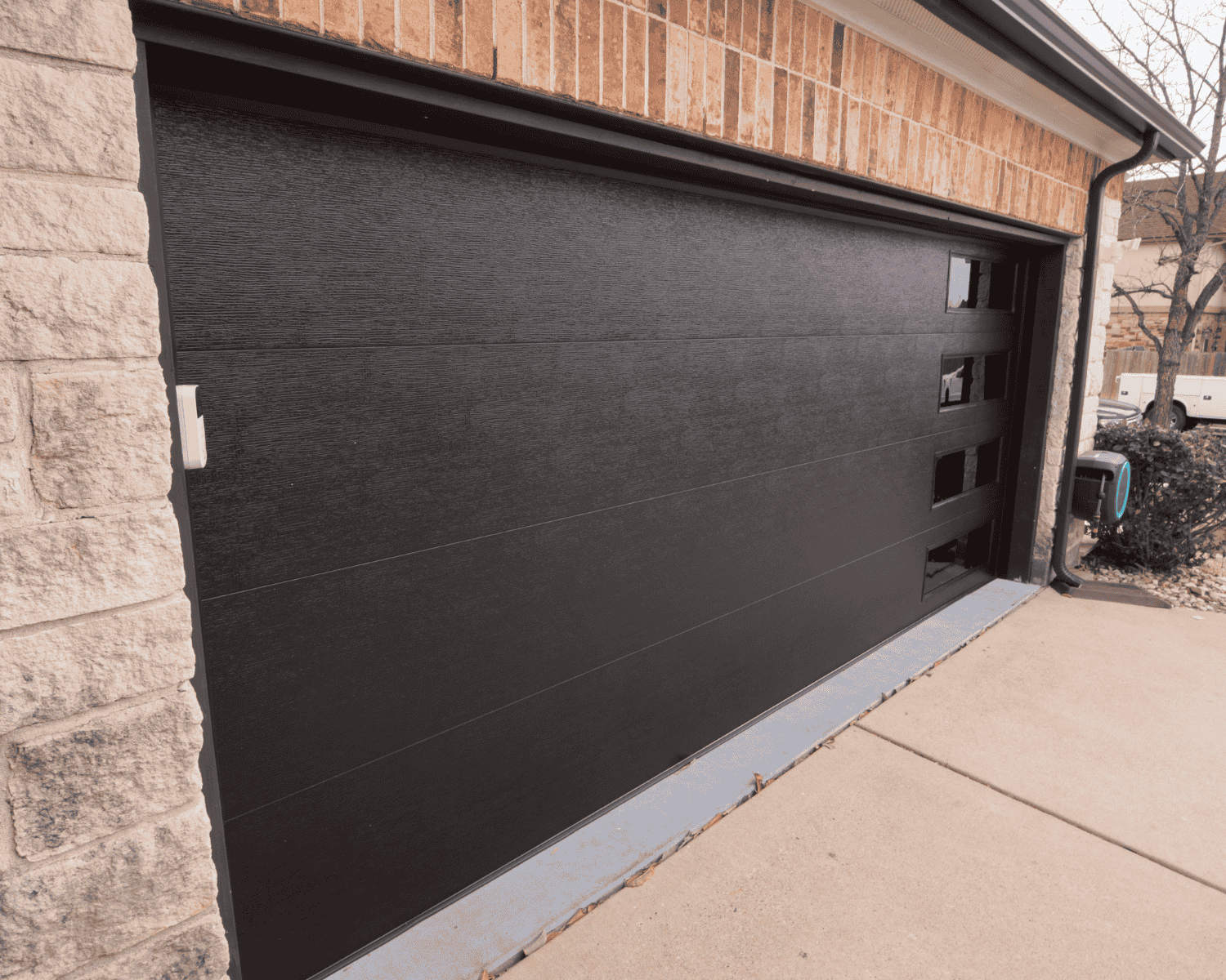 Dark brown garage door.Perfect garage door options.