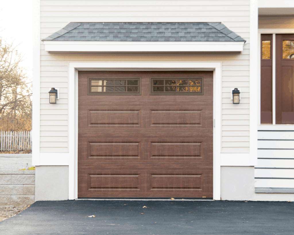 a modern one car garage with a wood paneled door-expert garage renovations in leetsdale