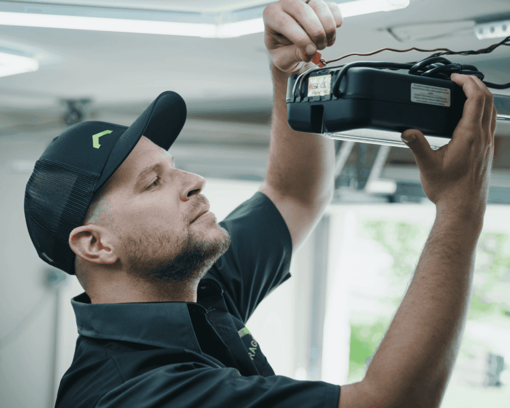 a garage up employee working on garage renovations in round rock texas. Garage Opener install.