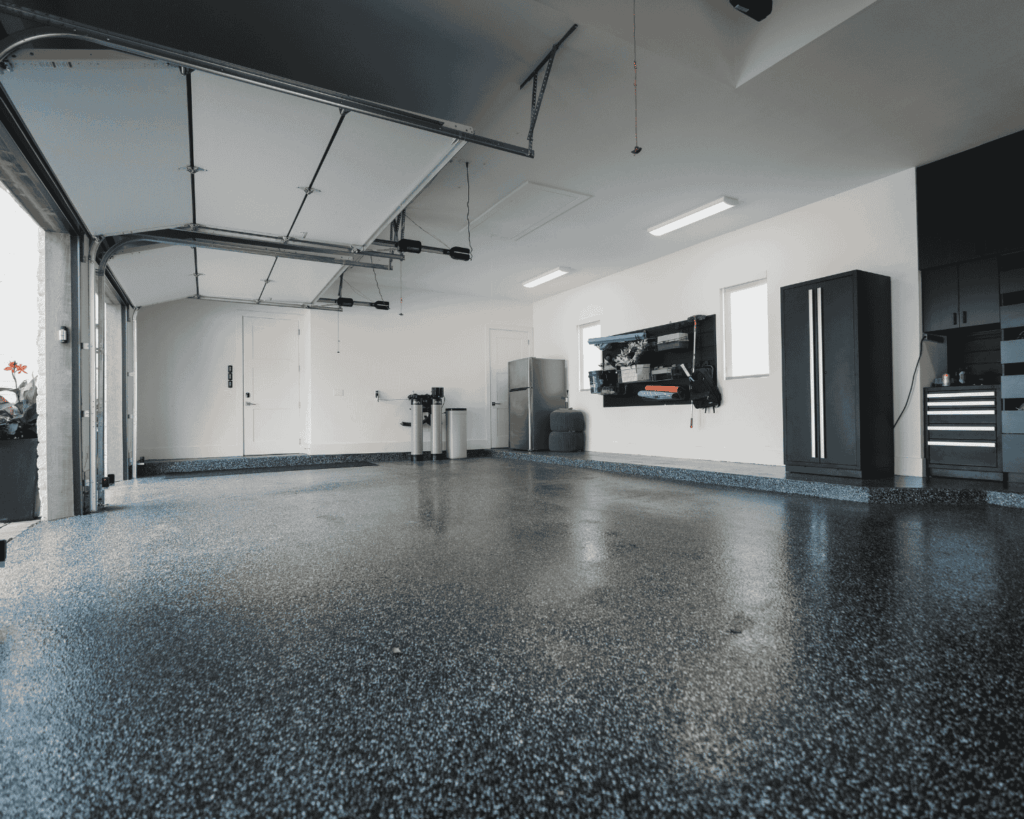 a finished epoxy floor installation job completed by Garage Up Austin